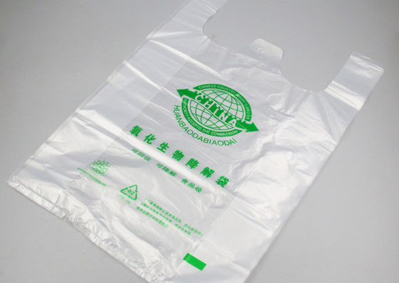 EN13432 18x58cm حقيبة تسوق تي شيرت بلاستيكية قابلة للتحلل يمكن التخلص منها