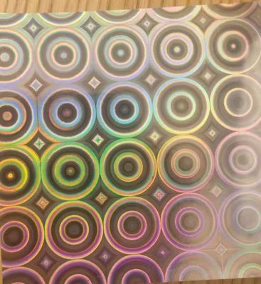 12mic PET / 17mic bopp طلاء أولوي هولوغرافي معدني يستخدم للطباعة فوق البنفسجية